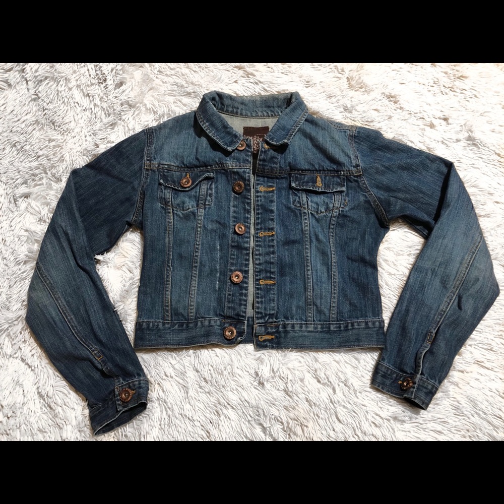 child’s distressed jean jacket.